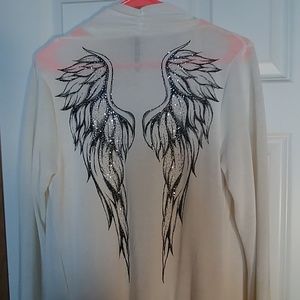 White sweater with angel wings on back